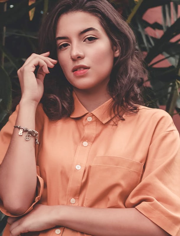 girl in a peach shirt