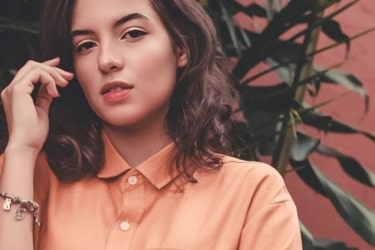 girl in a peach shirt